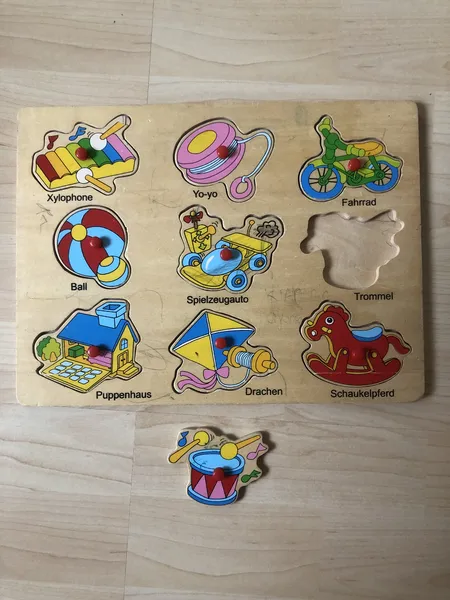 Pädagogische Holzpuzzles, Handgreifbrett